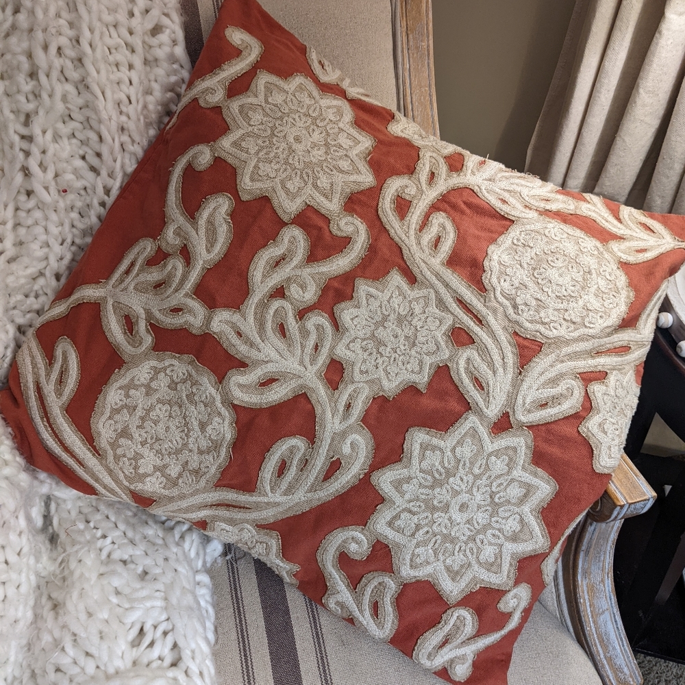 Two pottery barn rust and off white euro size pillow covers